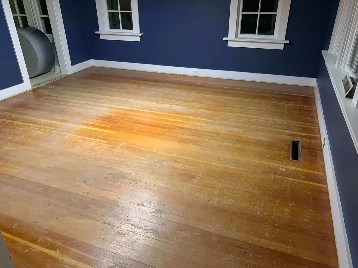 Orange-toned fir floor showing traffic wear